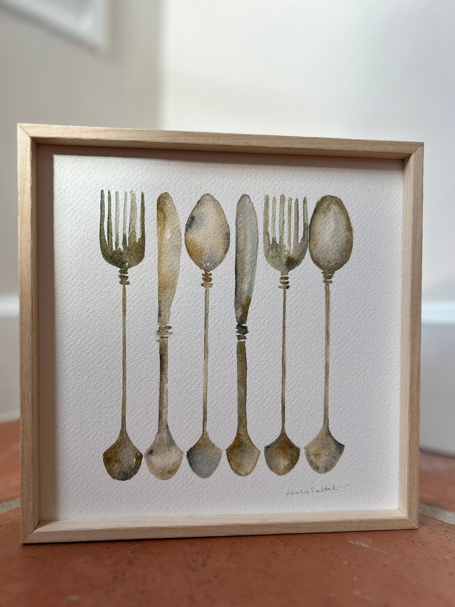 Cuadro decorativo para la cocina, es pequeño, ideal para una encimera, una estantería o un rincón con encanto. Son unos cubiertos en línea, cuchillo, cuchara y tenedor antiguos