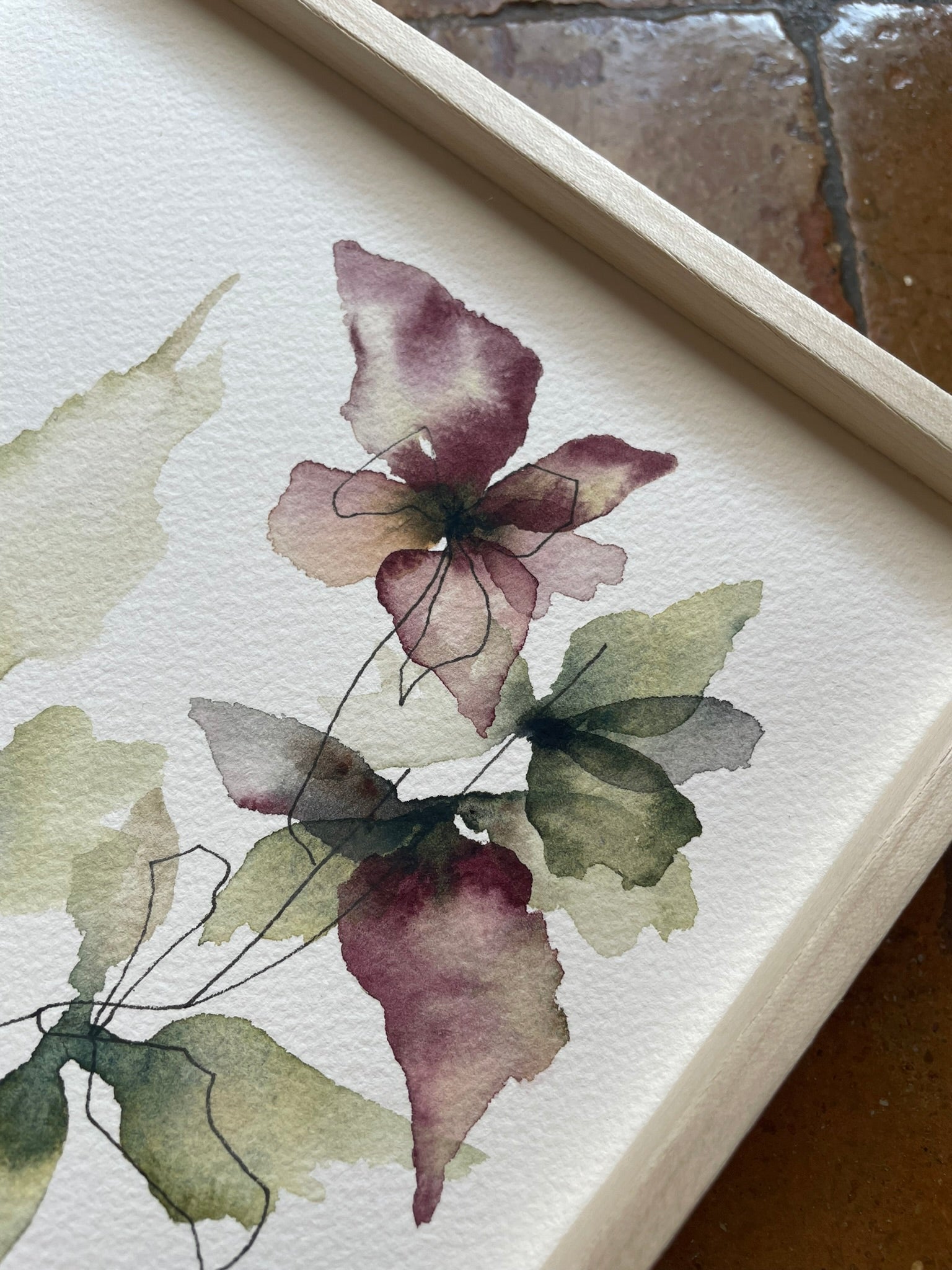 Detalle de cuadro botánico con flores para decorar estanterías, mesitas de noche o rincones especiales