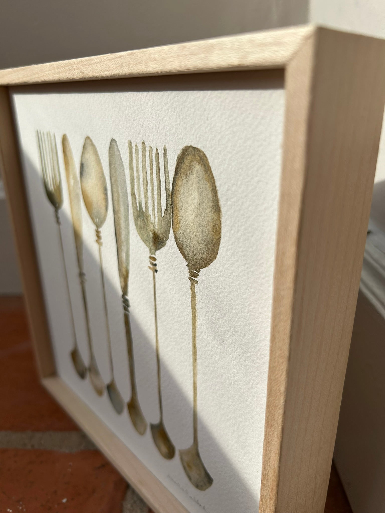 Lateral cuadro decorativo para la cocina o el comedor, detalle del enmarcado en madera natural, los pigmentos de la acuarela y la rugosidad del papel en algodón 100%